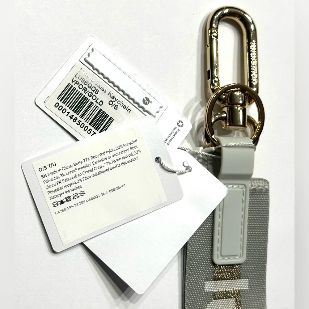 Lululemon Never Lost Keychain Wordmark Vapor Gold, NEW